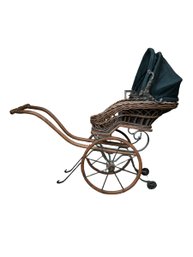 Antique Victorian , Cast Iron , Bent Wood And Wicker Baby Stroller  .