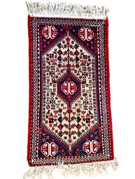 Vintage Persian Wool Rug. 3'4' X 1'10'