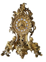 Antique 19th Century Gilt Bronze Mantel Clock In The Style Of Louis XVI With Cherub Accents