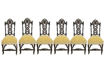 Six 1800's Gothic Revival Carved Walnut Figural Side Chairs With Front Twist Legs & Caster Wheels