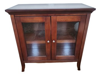 Small Dark Wood Stained Cabinet With Glass Doors