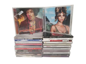 24 Music CD's: Led Zep, Jimmy Hendrix, Miranda Lambert, The Doors, The Beatles, Beyonce, AC/DC, Madonna & More