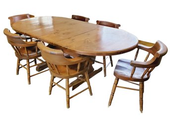 Vintage Solid Wood Double Trestle Oval Dining Table With Six Barrel Back Captain's Arm Chairs