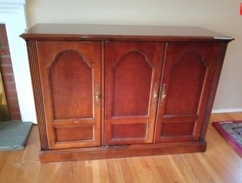 Beautiful Modern Entertainment Center With Walnut Finish Brass Hardware.