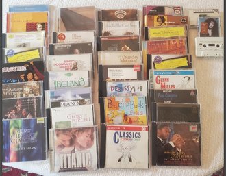 46 Music CDs And A Few Cassette Tapes