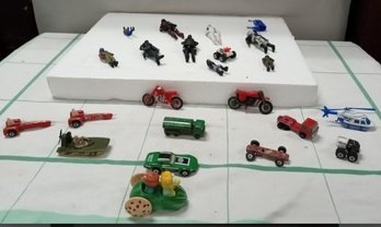 Assortment Of Small Soliders,die Cast Cars.    E1