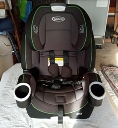 Beautiful Graco 10 Position Child's Car Seat      AS