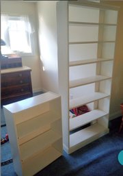 Two Nice Book Cases- One Press Board The Other Solid Wood.