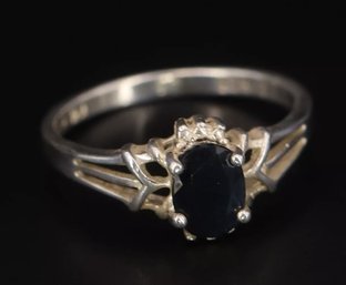 Oval-Cut Blue Sapphire Prong Set Engagement Ring In Sterling Silver