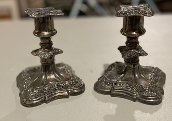 Two Weighted Antique Silver Plated Candlesticks