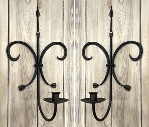 A Pair Of Wrought Iron Candle Sconces