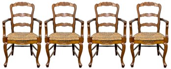 A Set Of 4 Carved Pine Rush Seated Arm Chairs In French Provincial Style