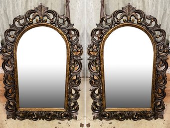 A Pair Of Ornately Framed Beveled Mirrors