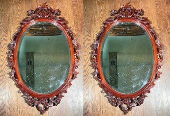 A Pair Of Large Carved Indonesian Hardwood Framed Mirrors