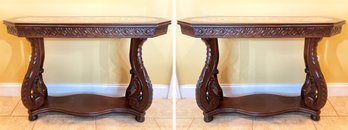 A Pair Of Carved Wood Console Tables With Inset Marble Tops And Seahorse Form Legs