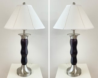 A Pair Of Modern Carved Wood And Brushed Steel Accent Lamps