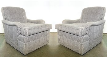 A Pair Of Fine Quality Modern Upholstered Swivel Arm Chairs