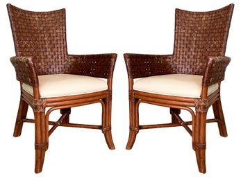 A Pair Of Vintage Coastal Rattan Arm Chairs With Leather Seats From ABC Carpet & Home