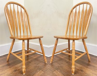 A Pair Of Vintage Oak Windsor Chairs