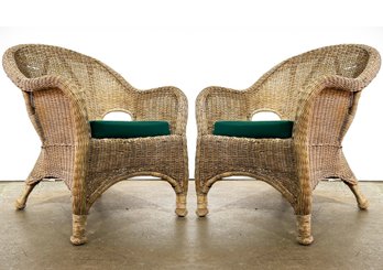 A Pair Of Vintage Wicker Arm Chairs With Kelly Green Cushions