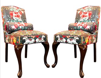 A Pair Of Vintage Side Chairs With Bolster Pillows IN Sacred Cow Print