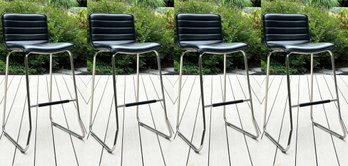 A Set Of 4 Modern Counter Stools In Chrome And Black Leather