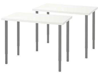 A Pair Of White Adjustable Height Desks