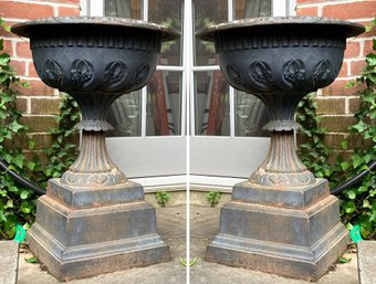 A Pair Of Large 19th Century Cast Iron Urns On Plinths