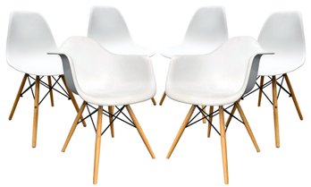 A Set Of 6 Molded Plastic And Wood Scandinavian Modern Chairs