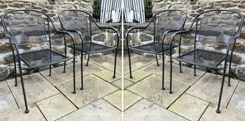 A Set Of 4 Modern Wrought Iron And Mesh Dining Chairs