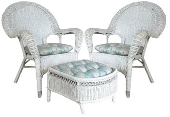 A Pair Of Vintage Wicker Chairs And An Ottoman