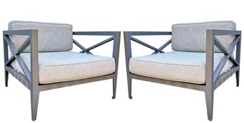 A Pair Of Modern Outdoor Arm Chairs With Cushions And Covers By Restoration Hardware
