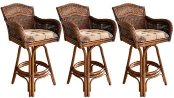 A Set Of 3 Rattan And Wicker Bar Stools With Tropical Cushions