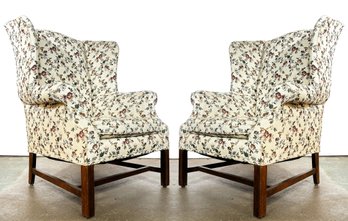 A Pair Of Vintage Wing Chairs In Cheerful Floral Print