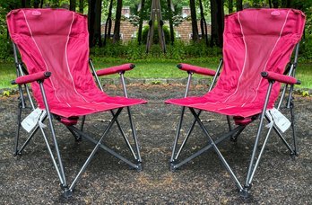 A Pair Of Collapsible Lawn Chairs