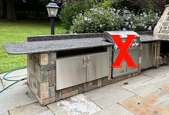 A Granite And Stone Outdoor Counter, And One Stainless Steel Cabinet - Left Of Pizza Oven