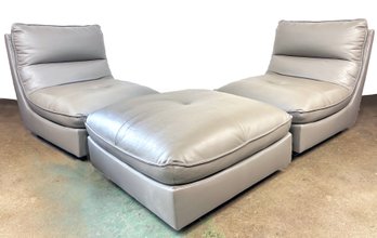 A Modern Three Piece Leather Chair And Ottoman Set - Versatile Could Be Used In Myriad Arrangements