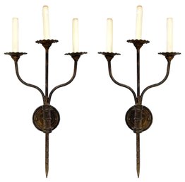 A Pair Of Wrought Iron Wall Sconces