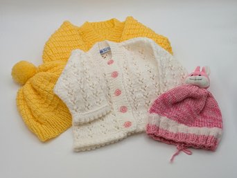 Hand Knitted Baby Sweaters And Caps