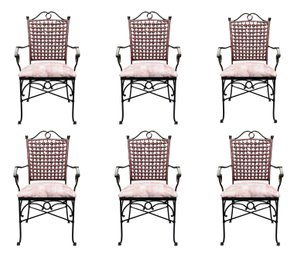 6 Wrought Iron Scroll Arm Chairs With Brown Wicker Backrests And Padded Seats