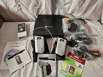 Camera Lot  - 2 Digital Cameras, DVD Player With Attachments, Data Pix Digital Camcorder And Other Accessories