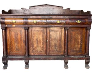 An Antique Empire Mahogany Sideboard With Clawfeet