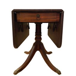Mahogany Single Drawer Drop Leaf Table With Brass Claw Feet And Lion Finger Pull On Drawer Face