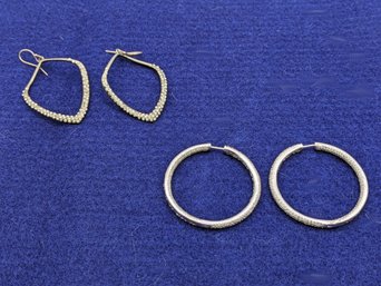 Two Pairs Of Hoop Earrings