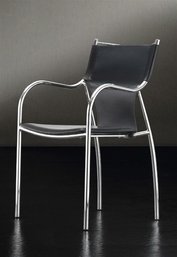 A Set Of 4 Stainless Steel Leatherette Chairs