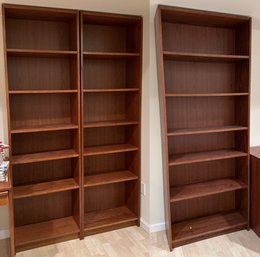 Three Brown Modern IKEA Billy Bookcases