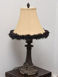 Ornate Boudoir Lamp With Feather Trimmed Shade And Decorative Metal Base
