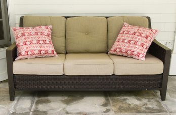 Sunbrella Indoor/Outdoor Dark Chocolate Rattan Couch With 2 Pottery Barn Reversible Throw Pillows