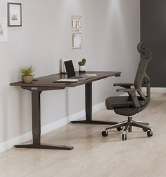 An Uplift V2 Commercial Standing Desk - Black Base, Walnut Finish Top - NIB - Needs Assembly