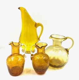 Grouping Of 4 Handblown Vintage Amber Pitchers